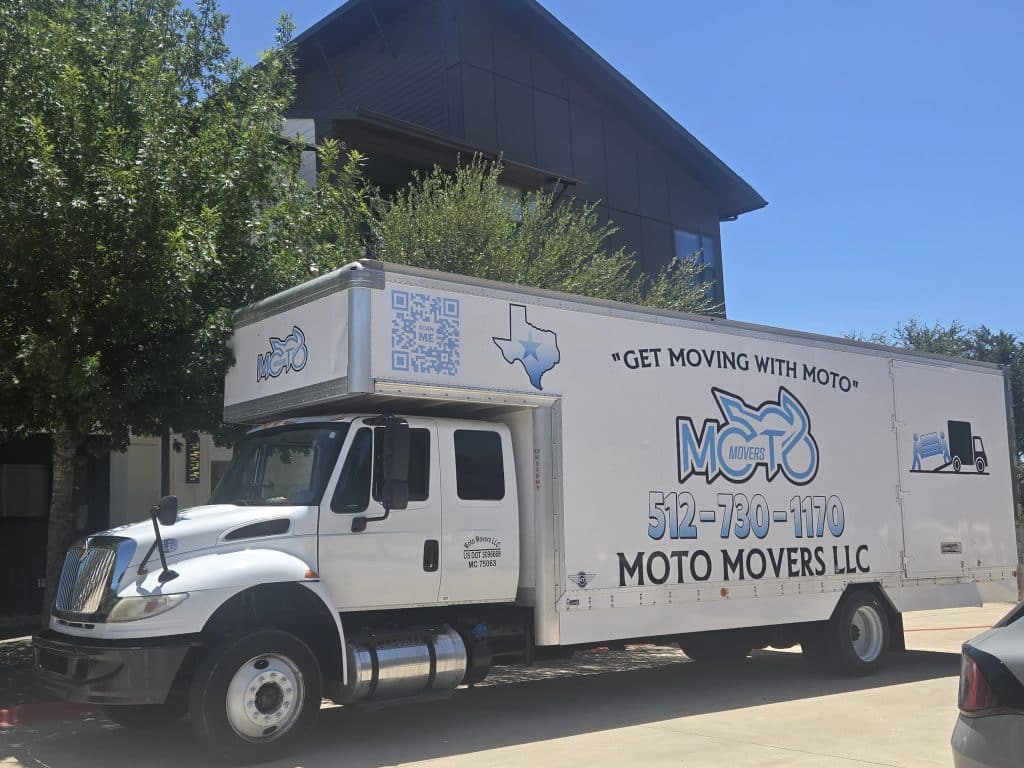 Moto Movers at Pearl Lantana Apartments. Moto Movers moving truck parked at Pearl Lantana Apartments in Austin, Texas.